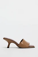 HEELED LEATHER SLIDES