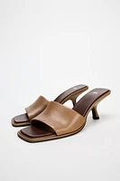 HEELED LEATHER SLIDES