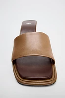 HEELED LEATHER SLIDES