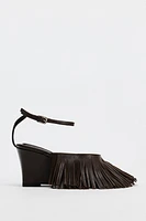 FRINGED LEATHER WEDGES