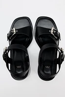 BUCKLED LEATHER SANDALS