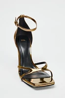 OVAL HEELED METALLIC SANDALS