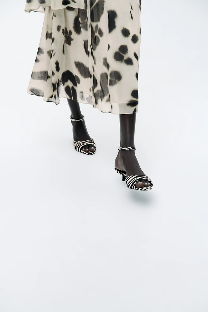 ANIMAL PRINT LEATHER KITTEN HEEL SANDALS