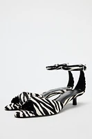 ANIMAL PRINT LEATHER KITTEN HEEL SANDALS