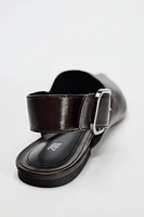 LEATHER MULES WITH BUCKLE