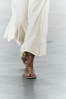 EMBELLISHED TIED LEATHER SANDALS