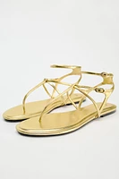 FLAT METALLIC SANDALS