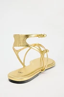 FLAT METALLIC SANDALS