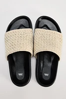 WOVEN FLAT SANDALS