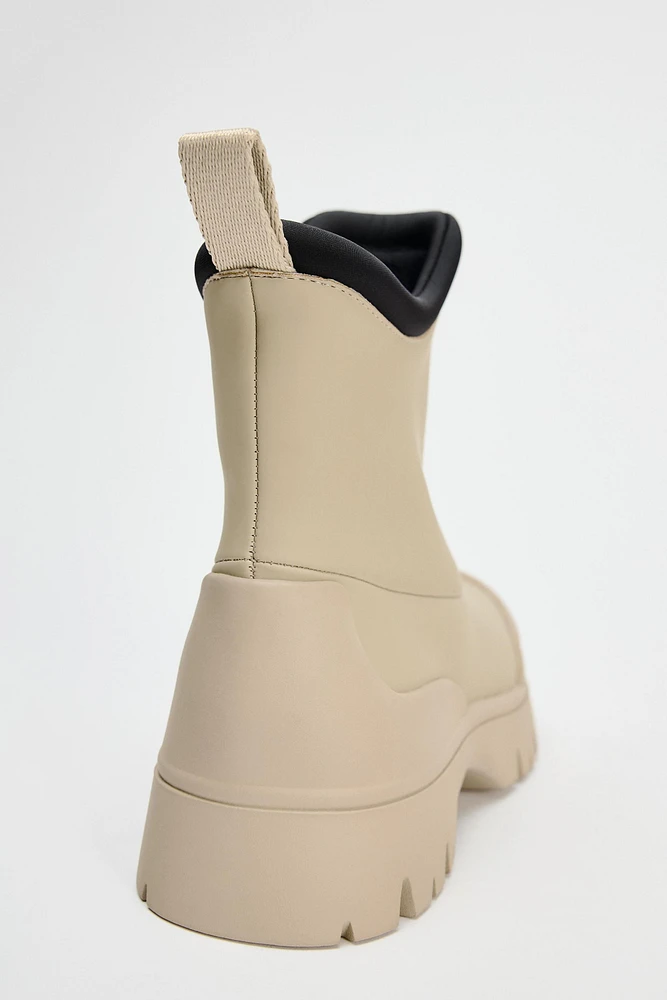 RUBBERIZED EFFECT ANKLE BOOTS