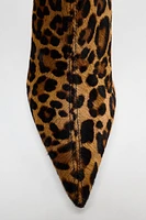 ANIMAL PRINT HEELED LEATHER BOOTS