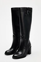 BUCKLED KNEE HIGH HEELED BOOTS