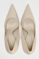 Stiletto heel patent effect high heels. Pointed toes and round topline. <br/><br/>Heel height: 3.7 inches (9.5 cm)