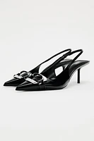 SLINGBACK HEELS WITH METAL PIECE