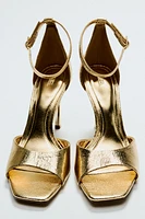 METALLIC EFFECT HEELED SANDALS