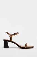 STITCHED HEELED LEATHER SANDALS