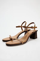 STITCHED HEELED LEATHER SANDALS