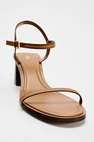 STITCHED HEELED LEATHER SANDALS