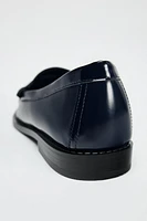 RUCHED LOAFERS WITH METALLIC DETAILS