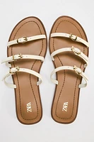 FLAT SANDALS WITH LEATHER STRAPS