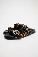 ANIMAL EMBOSSED LEATHER SLIDES