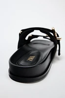 ANIMAL EMBOSSED LEATHER SLIDES