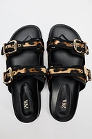 ANIMAL EMBOSSED LEATHER SLIDES