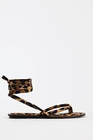 ANIMAL PRINT FLAT SANDALS