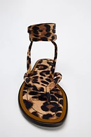 ANIMAL PRINT FLAT SANDALS