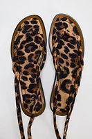 ANIMAL PRINT FLAT SANDALS