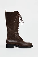 LACE-UP FLAT LEATHER BOOTS