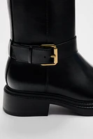 FLAT BUCKLED ANKLE BOOTS