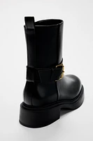 FLAT BUCKLED ANKLE BOOTS