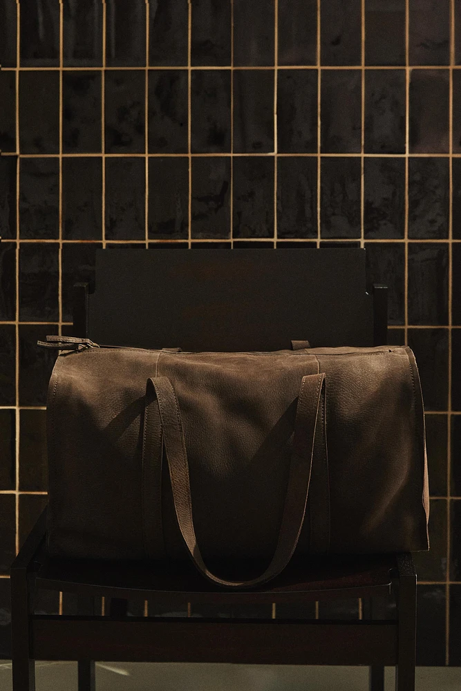 FADED LEATHER TRAVEL BAG