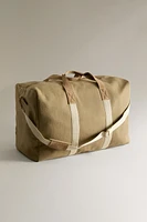 FABRIC SUITCASE WITH LEATHER DETAIL