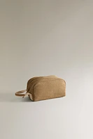 MINIMALIST MAKEUP BAG WITH LEATHER DETAIL