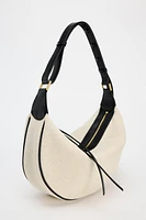 OVAL CROSSBODY BAG