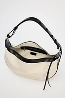 OVAL CROSSBODY BAG