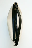 OVAL CROSSBODY BAG