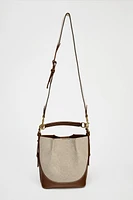 TOPSTITCHED BUCKET BAG