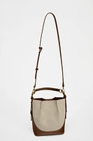 TOPSTITCHED BUCKET BAG