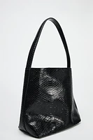 EMBOSSED LEATHER BUCKET BAG