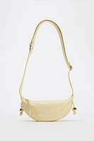 OVAL CROSSBODY BAG