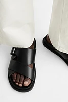 Crossover buckled sandals