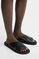 CROSSED SANDALS