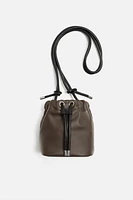 LEATHER BUCKET BAG X NANUSHKA