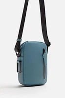 RUBBERIZED CROSSBODY BAG