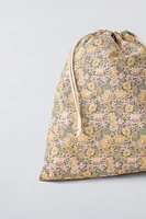 Bag with floral print. Adjustable lace-up closure.<br/><br/>Height x Length x Width: 13 x 11.4 x 0.8 inches (33 x 29 x 2 cm)