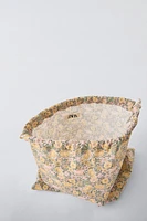 Bag with floral print. Adjustable lace-up closure.<br/><br/>Height x Length x Width: 13 x 11.4 x 0.8 inches (33 x 29 x 2 cm)