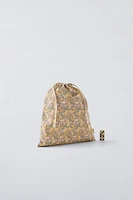 Bag with floral print. Adjustable lace-up closure.<br/><br/>Height x Length x Width: 13 x 11.4 x 0.8 inches (33 x 29 x 2 cm)